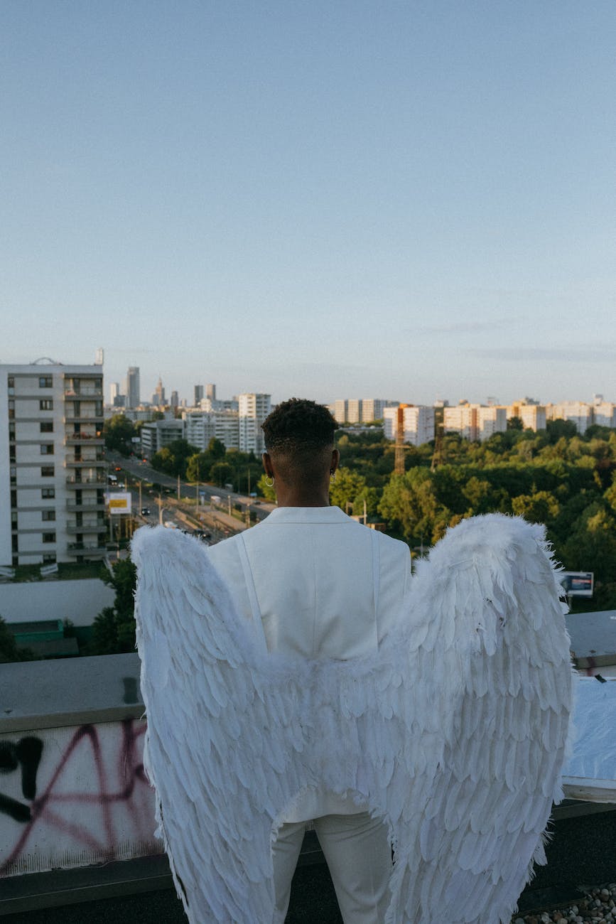 back view of a man wearing an angel costume